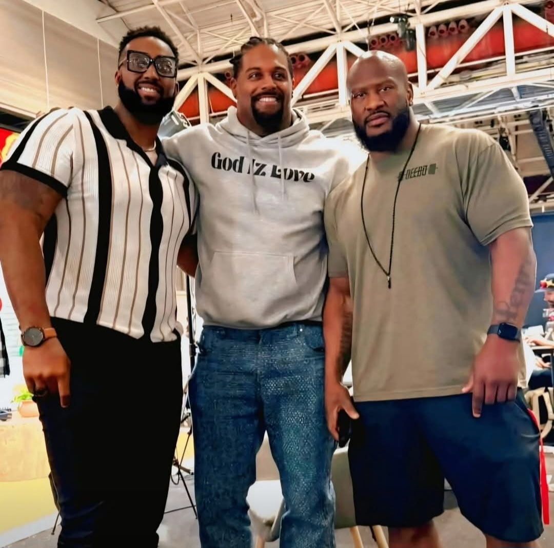 Tony Hills with Cam Jordan and James Harrison at an event