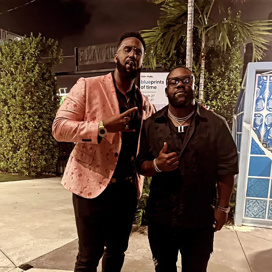 Tony Hills with Mark Ingram at an event